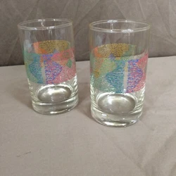 The pattern is MIrage and the glasses hold 8 ounces. The glasses are 4” high and are 2 ⅜” wide across the top.