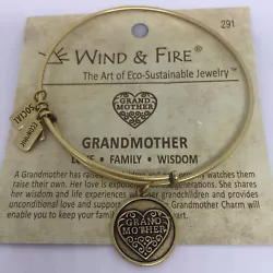AUTHENTIC WIND & FIRE BRACELET. The plating on the bracelet has slightly worn off.