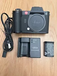 Leica SL2-S body. Box with all the paperwork. Battery cord.