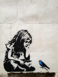 Girl with Bluebird, graffiti art by Banksy, 15