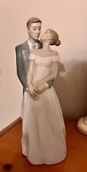 Nao by Lladro Figurines- Unforgettable Day. Perfect condition, like new. No chips or cracks. Beautiful figurine, makes...