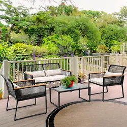 MODULAR PATIO SET: The woven rattan sofa stands out with mixed colored armrests - natural wood and black materials...