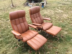 Pair of Ekornes Stressless Reclining Leather Chairs with Matching Ottomans. All 4 pieces in great condition, no tears...