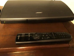 Bose lifestyle v35 console. Unit is in working condition. Shows a slight scratch on top of consul. See photos.