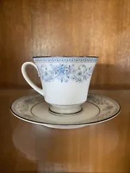 This beautiful tea cup and saucer set from Noritakes Contemporary Fine China Blue Hill 2482 collection will make a...
