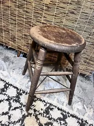 This antique stool from S. Bent Brothers is a timeless piece that will add rustic charm to your home. Crafted from...