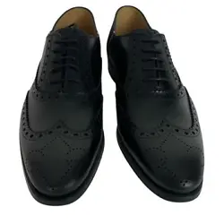 Features Formal Brogue Shoes, Signature Perforate Details, Iconic Moniker Embellished across the Heel, Stripes...