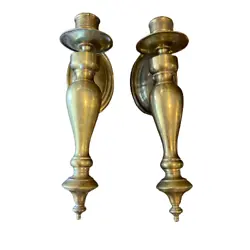 This is a beautiful pair of brass wall sconce candle holders. There is some damage to the upper side of one of the...