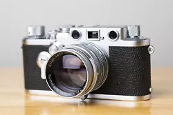 Leica IIIf (serial #713962) silver 1954. Leica 50mm f/1.5 Summarit (serial #1120181). Front lens cap included. Single...