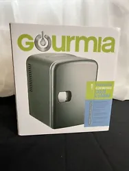 Gourmia Thermoelectric 6 Can Mini Fridge Cooler & Warmer NEW Brand new in original box. Color is black Benefits charity...