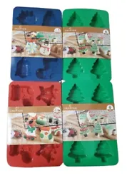 CROFTON Holiday Silicone Bakeware Lot Of 4 NEW Christmas pans. Each pan makes 6 cookies or cakes. 2 with tree shapes....