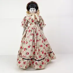 This is an Antique China Head Doll with a Pink Flower Dress & Hood made by Hertwig & Co. in Germany. Hertwig Germany...
