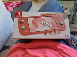 Console Nintendo Switch corail.