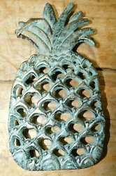Heres a great cast iron trivet. Can be used as a plaque or a trivet. 7 7/8