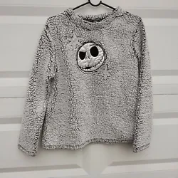 This is a great top from Nightmare Before Christmas. It’s a soft, fuzzy fleece in a size small. Length from the back...