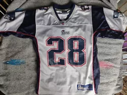 Reebok NEW ENGLAND PATRIOTS # 28 COREY DILLON NFL Jersey Size medium. Small stain on bottom right corner of front of...