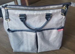 Skip Hop Diaper Bag. Fantastic condition.  Plenty of storage. Best long lasting and sturdy diaper bag.  Easy to clean.