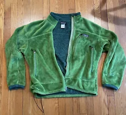 Patagonia Fleece Jacket. Size Large. Green in color. Super warm. Measures 28” top to bottom & 24” across. There is...