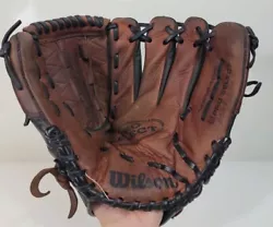 Glove is has been worn in a bit. Writing on the glove. Inside of the glove does flake.