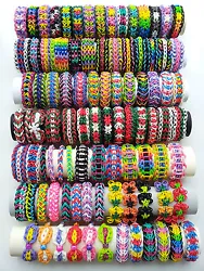 This isa lot of 5 bracelets you pick from a collection of 92 bracelets with different designs and colors. All white...
