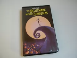 Music, lyrics and score by Danny Elfman. VHS and case are in very good condition.