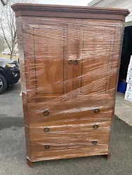 Stickley 21st Century Collection Oak Gentlemens Armoire Chest. There’s small damaged areas along the bottom legs...