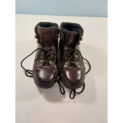 Style: Hiking Trail Boots. Upper Material: Leather. Color: Black. Secondary Color: Brown.
