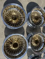 Set of 4 Gold and Chrome 14x7 China 72 spoke reversed rims. No equipment included! Rims only!