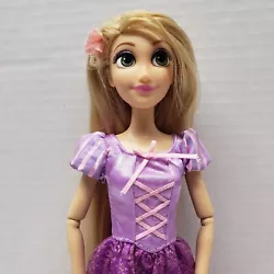 I do not have shoes for this doll. This doll is articulated with poseable arms, elbows, and wrists. She has snap-pose...