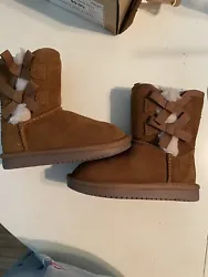 Embrace the winter with these stylish and comfortable Koolaburra by UGG Victoria Toddler Girls Short Chestnut Suede...