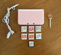 3DS works well and is in good condition.The 3DS comes with 7 games: Tomodachi Life , Barbie Dreamhouse Party, Lego...