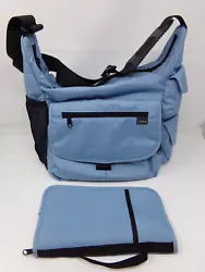 Color is a light blue with black trim. Great for travel, work or school. Adjustable strap to shoulder or crossbody, top...