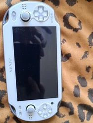 PlayStation Vita Assassin’s Creed III Liberation Bundle White Handheld NO BOX.  Some light surface area scratches...
