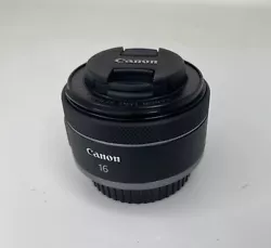 This Canon lens is in very good condition with a few scuffs on the body. The lens is clear. - We open Unpaid Item cases...