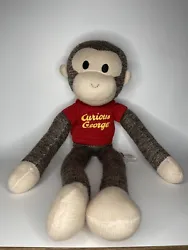 This Curious George Schylling Sock Monkey Stuffed Animal Plush Doll is perfect for any fan of the beloved childrens...
