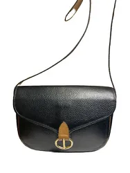 This beautiful crossbody shoulder bag from Dior is a must-have for any fashion-savvy woman. The exterior is made of...