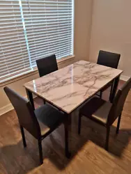 Faux Marble Dining Table with 4 Chairs. Easy Assembly. MaterialWood, Faux Marble. • White faux marble table top. •...