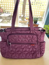 Purple Skip Hop diaper bag, in good condition. Has inside stroller straps so you can hang on the back of your stroller...