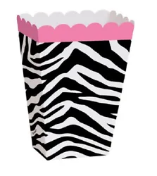 Black and white zebra pattern with a pink accent.
