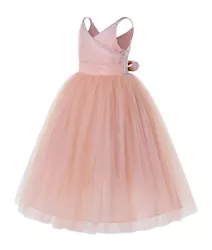 The elegant tulle skirt has 6 layers, top 3 layers are made of tulle. The back of the dress has zipper closure and ties...