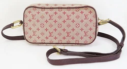 LOUIS VUITTON Juliette MM. Mini Lin monogram canvas and leather. Discoloration, rubbing, wrinkles and stain on zipper...
