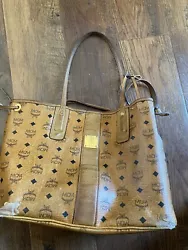 Authentic Pre Owned. MCM Reversible Visetos Liz Tote. Medium. Could use some repair/TLC or use as is. All MCM hardware...