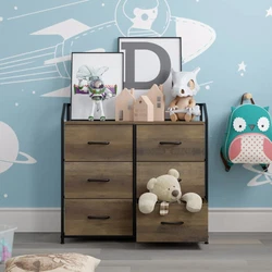 The Homfa bedroom dresser has six fabric drawers with simple-to-pull knobs; the wood-fronted drawers are covered in...