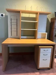 Deluxe IKEA Desk with shelves, dry-erase board, storage & drawer on wheels. This desk & hutch has multiple racks for...