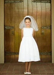 A Classy pick for your little girl - this Satin Communion dress with Pleated skirt. Hidden zipper enclosure and...