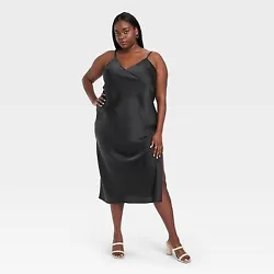 •Model is wearing size XS in video •Maxi slip dress •Lightweight fabric •Deep V-neckline •Side slit...