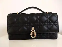 You are buying this Authentic Christian Dior Black Miss Dior Mini Bag. The Miss Dior mini bag expands the line with an...