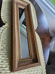 .Vintage Ethan Allen wood/gold ornate large mirror. 22x17x4. Very good condition for age. Can be hung 2 ways.