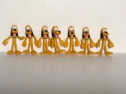 Bring home the lovable Pluto with this lot of 7 PVC toy figures from the Walt Disney Store. Each figure features the...