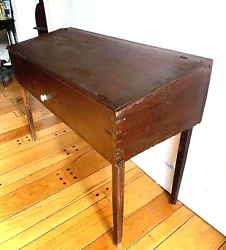 Legs show age. It is a fabulous piece of antique primitive furniture. Nails are hand fashioned. 33